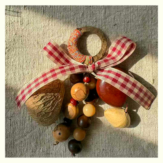 Bow Tie Natural Shell Rattle Charm - Red