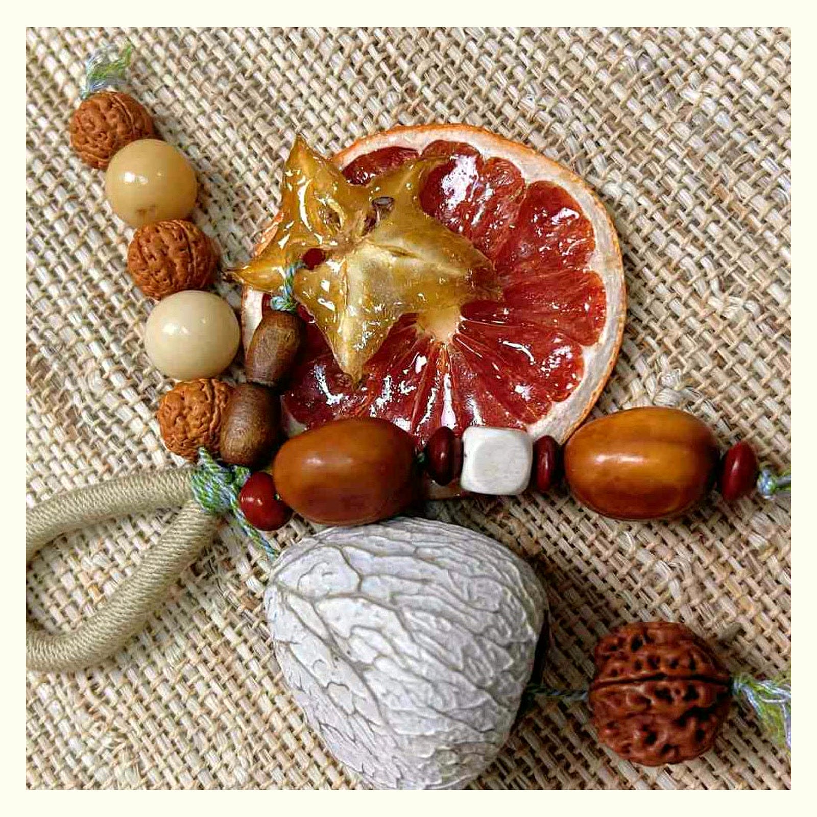 New Year Fruit Shell Rattle Charm - Grapefruit